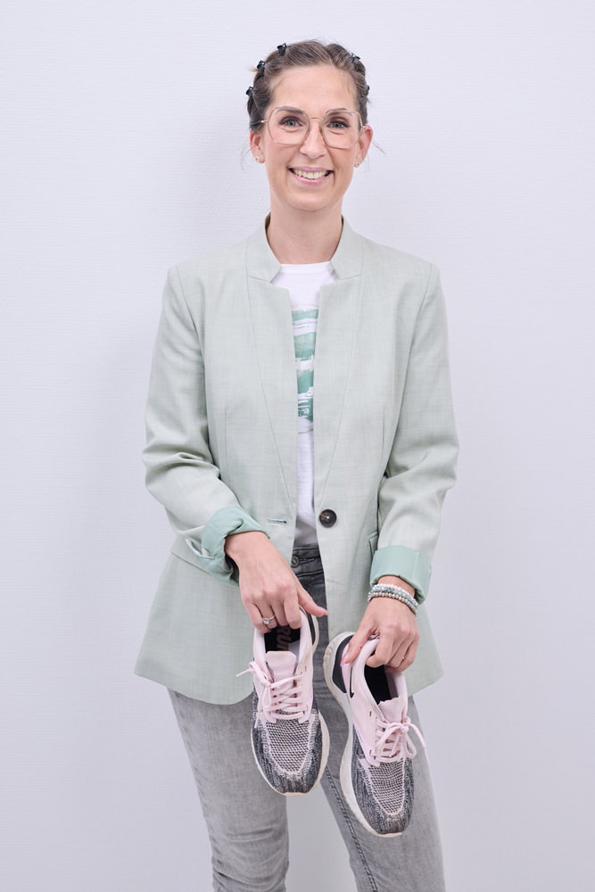 Sarah Rosendahl Sarah Rosendahl mit Laufschuhen als Teil der DLMC-Teamkampagne.